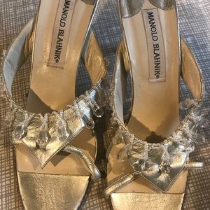 Manolo Blahnik slip on short heel.